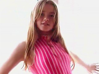 Lovely Blond Girl Dancing In A Pink Body